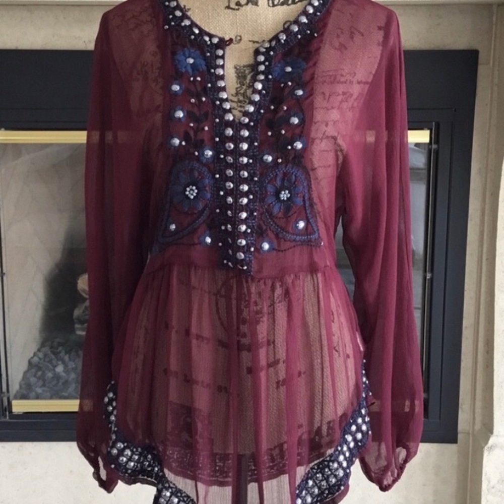 Free People embroidered top with silver buttons.
